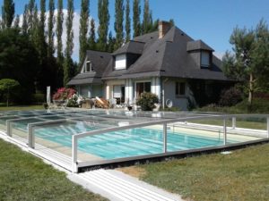Abri de piscine semi-plat en alu blanc et polycarbonate à Saint Martin de Borscheville 76 - RENOVAL ABRIS SEINE MARITIME
